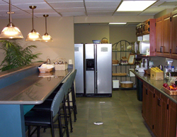 The Garden Lounge, with kitchen, dining area and living space, serves as the comfortable commons area for residents of the Sober Residence.