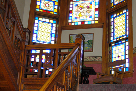 The woodwork and stained glass windows were redone to restore the original beauty.