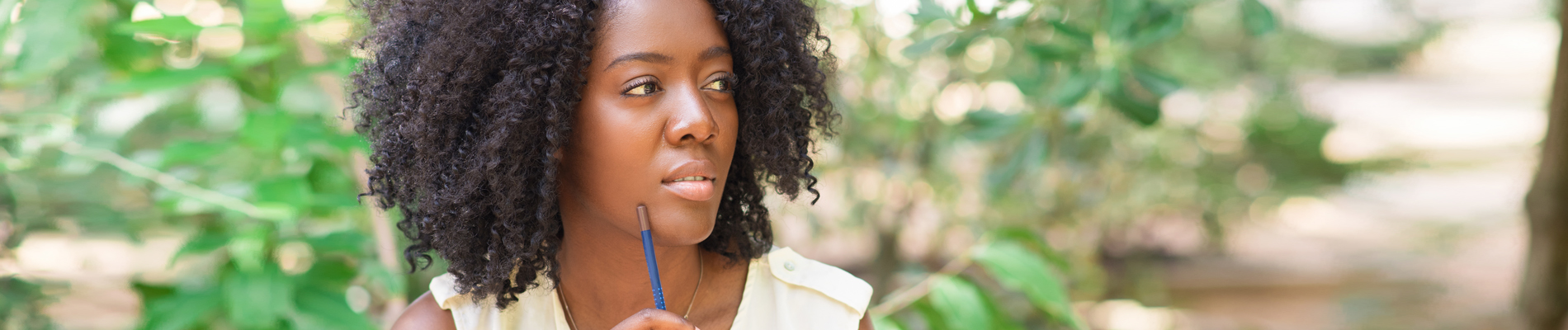 Woman in thought in nature scene
