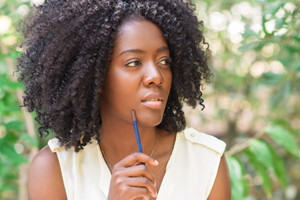 Woman in thought in nature scene