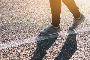 Walking a straight white line along roadway