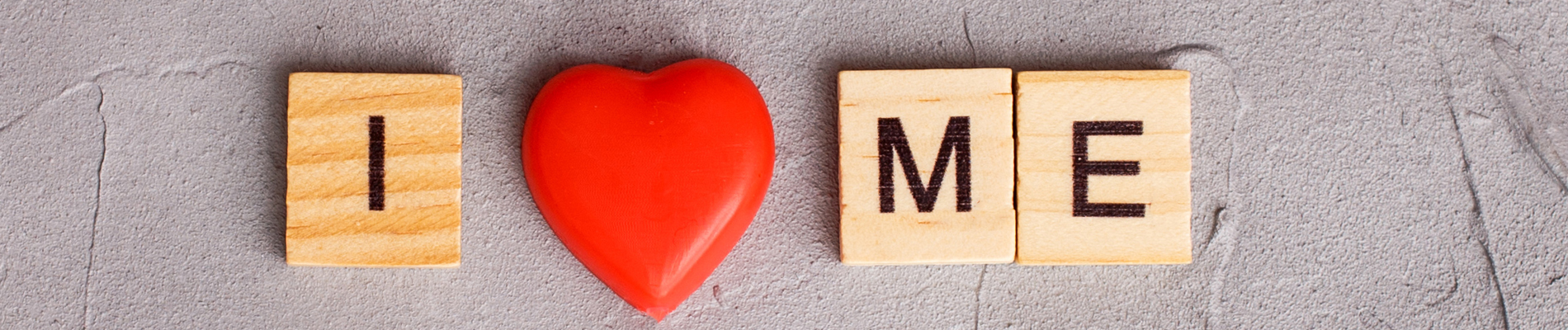 wooden blocks spelling out I heart me