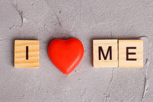 wooden blocks spelling out I heart me