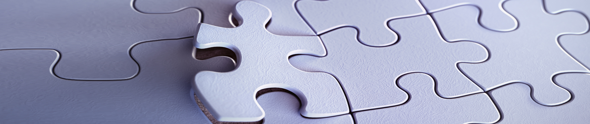 White puzzle pieces with one out of place
