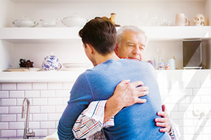Two men hugging in acceptance