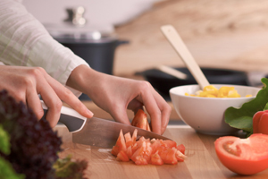 A salad being prepared on a counter top
