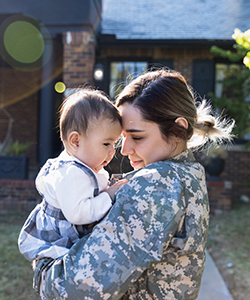 Female Soldier with Child